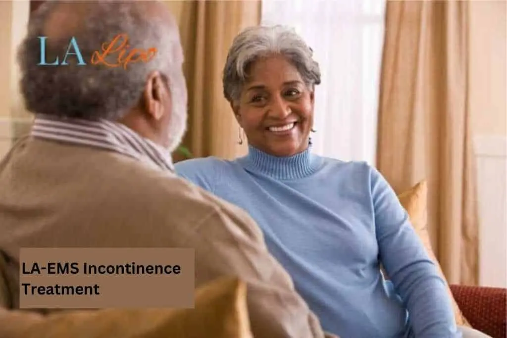 Couple sat smiling at each other - LA-EMS treatment West Hampstead