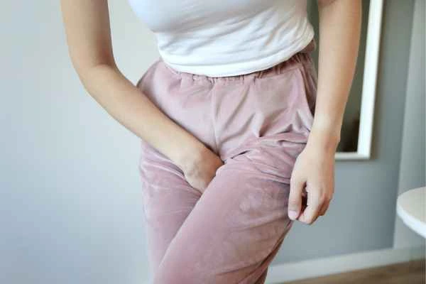 woman struggling with urine incontinence West Hampstead